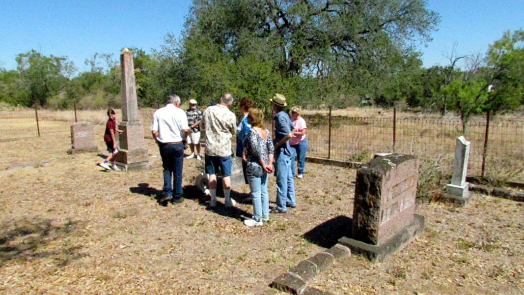 Descendants of Pastor Adolf Fuchs visit his grave site during the 2011 Fuchs/Fox Family Reunion.
